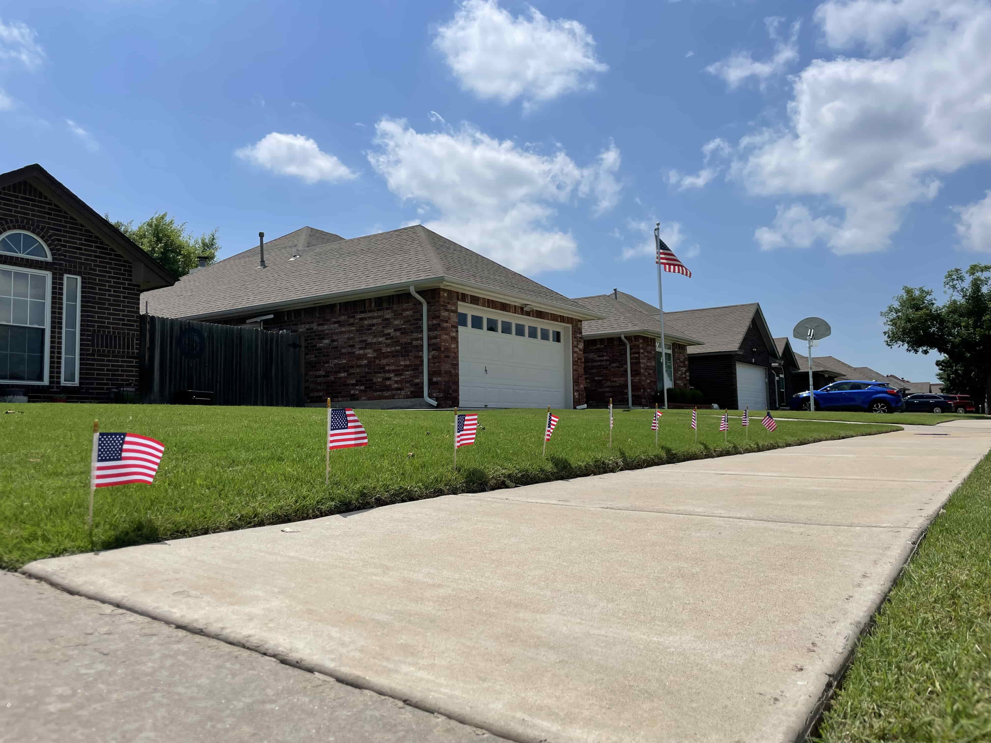 lawn with US Flags implanted